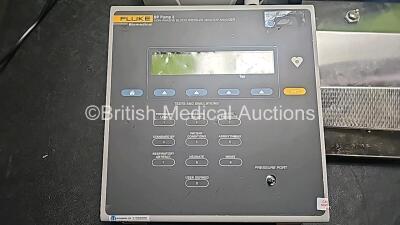 Mixed Lot Including 1 x Fluke Biomedical BP Pump 2 Blood Pressure Monitor Analyzer (No Power),1 x Druck DPI 705 Digital Pressure Indicator (Powers Up),1 x Biomet Ref 4232 Footswitch, 2 x Alaris Infusion Systems, 1 x Aquilon Pro Nebuliser and 1 x ResMed VP - 4