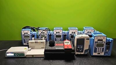 Mixed Lot Including 1 x B.Braun Infusomat Space Infusion Pump (Powers Up with Stock Power Supply-Stock Power Supply Not Included), 1 x Philips Module Rack, 6 x CareFusion Alaris SE Infusion Pumps, 1 x CareFusion GP Guardrails Plus Infusion Pump and 1 x Qu