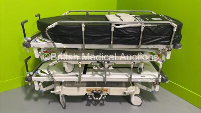 2 x Huntleigh Lifeguard Patient Trolleys with 2 x Mattress (Hydraulics Tested Working - 1 x Missing 1 Wheel - See Pictures) *S/N P0314227 / 65789*