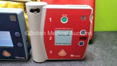 Job Lot Including 1 x Laerdal FR2 Defibrillator (Powers Up) in Case with 1 x Battery *Install Before - 2022 and 1 x Laerdal AED Trainer 2 (No Power Suspected Flat Battery) - 2