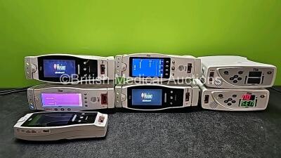 Job Lot Including 5 x Masimo Set Radical 7 Signal Extraction Pulse CO-Oximeters (All Power Up and 1 x Cracked Casing - See Photo) with 4 x Docking Stations (4 x Damaged Casing - See Photos) and 2 x Masimo SET Rad-8 Signal Extraction Pulse Oximeters (1 x P