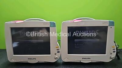 2 x Philips IntelliVue MP50 Touch Screen Patient Monitors (Both Power Up, Both Missing Internal Batteries,1 x Scratched Screen and Both Damaged Casings - See Photos)