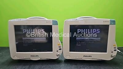 2 x Philips IntelliVue MP50 Touch Screen Patient Monitors (Both Power Up, Both Missing Internal Batteries,1 x Scratched Screen and 1 x Damaged Casing - See Photos)