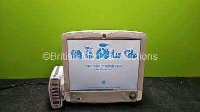 GE Carescape B650 Touch Screen Patient Monitor (Powers Up and Slight Scratched Screen - See Photo) with GE Dinamap Ref 2016793-002 Patient Data Module *Mfd 2020*(Powers Up) Including ECG, Temp/CO, P1/P3, P2/P4, SpO2 and NIBP Options and 1 x Blank Module *