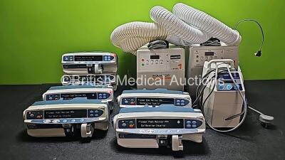 Mixed Lot Including 2 x CareFusion Alaris GH Plus Syringe Pumps (Both Power Up with Calibration Invalid - See Photo) , 4 x CareFusion Alaris CC Plus Syringe Pumps (All Power Up with Calibration Invalid and 1 x Crack to Case - See Photos), 2 x Smiths Equat