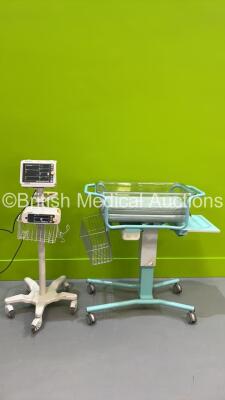 1 x Philips SureSigns VM6 Patient Monitor on Stand with ECG, SPO2, BP and T1 Options, 1 x Philips Suresigns VM1 Monitor with SPO2 Option and 1 x Bristol Maid Bedside Cot (Both Power Up) *S/N CN42785552 / MB93600448*