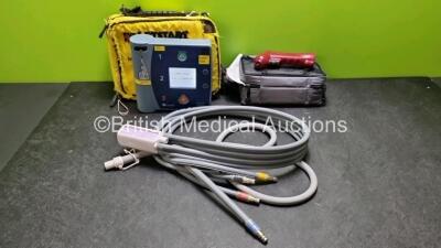 Mixed Lot Including 1 x Laerdal FR2+ Defibrillator (Powers Up) In Case, 1 x EZ - I Power Driver LIS in Case and 1 x Mangar Emergency Lifting Cushion with 2 x Remotes (1 x with Cut Tubes - See Photo)