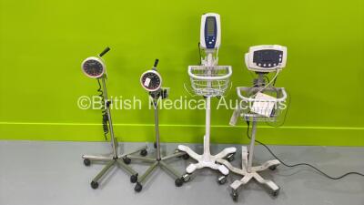 1 x Welch Allyn 53N00 Vital Signs Monitor on Stand, 1 x Welch Allyn SPOT Vital Signs Monitor on Stand (Both Power Up) and 2 x Blood Pressure Meters on Stands