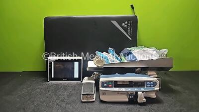 Mixed Lot Including 1 x Ambu aView Ref - 405002000 Monitor (Powers Up and Damaged Screen - See Photo), 1 x Anetic Aid Attachment with Cushion, 1 x Maquet T519.7000/03 Attachment, 1 x CareFusion Alaris GH Syringe Pump (Powers Up and Cracked Case - See Phot