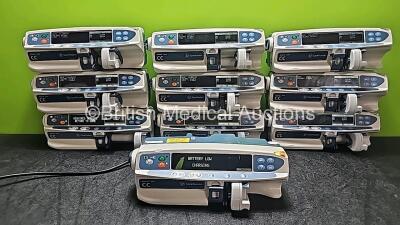 10 x CareFusion Alaris CC Plus Syringe Pumps (All Power Up and 1 x Cracked Screen - See Photo) *SN 800339353 / 135051824 / 135056671 / 135056646 / 135056686 / 135056657 / 135056635 / 135056663 / 135056668 / 135056691*