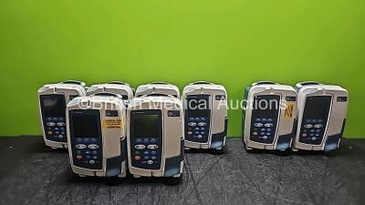 15 x CareFusion Alaris GP Plus Infusion Pumps (6 x in Photo - 15 x in Total) and 2 x CareFusion Alaris GP Guardrails Plus BD Infusion Pumps (1 x Cracked Case)