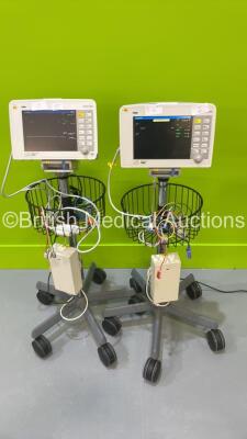 2 x Drager Infinity Delta Patient Monitors on Stands with Selection of Leads (Both Power Up)