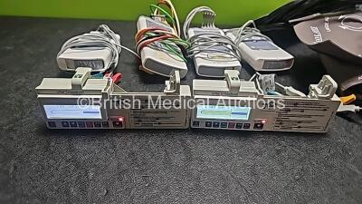 Mixed Lot Including 4 x GE Carescape Telemetry T4 ECG Transmitters with 2 x 5 Lead ECG Leads and 2 x 3 Lead ECG Leads, 2 x CME T34 Syringe Pumps (All Power Up with Stock Battery- Stock Battery Not Included and 1 x Cracked Case- See Photo) and Assorted Pat - 3