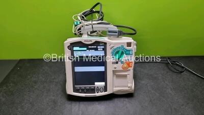 Philips Heartstart MRx Defibrillator / Monitor (Powers Up) Including ECG, NIBP, SpO2 and Printer Options with 1 x Paddle Lead, 1 x Philips M3725A Test Load, 1 x Laerdal QCPR Meter, 1 x Philips M3538A Battery and 1 x Philips M3539A Module