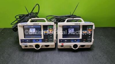 2 x Physio Control Medtronic Lifepak 20 Defibrillators / Monitors (Both Power Up 1 x Missing Door) Including Pacer, ECG and Printer Options with 2 x Paddle Lead and 2 x 3 Lead ECG Leads