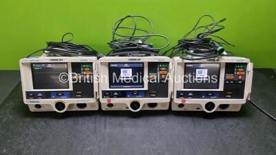 3 x Physio Control Medtronic Lifepak 20e Defibrillators / Monitors (All Power Up) Including ECG and Printer Options with 3 x Paddle Lead and 3 x 3 Lead ECG Leads