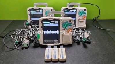 3 x Philips Heartstart MRx Defibrillators (All Power Up) Including ECG, C02 and Printer Options with 3 x Paddle Leads, 3 x Philips M3725A Test Loads, 3 x Laerdal QCPR Meters, 3 x Philips M3538A Batteries and 3 x Philips M3539A Modules