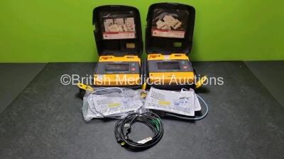 2 x Medtronic Physio Control Lifepak 1000 Defibrillators (Both Power Up Both with Slight Crack In Casing - See Photos) In Carry Case with 1 x 3 Lead ECG Leads, 2 x Batteries and 2 x In Date Electrode Packs