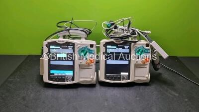 2 x Philips Heartstart MRx Defibrillators (Both Power Up) Including Pacer ,ECG, C02 and Printer Options with 2 x Paddle Leads, 2 x Philips M3725A Test Loads, 2 x Laerdal QCPR Meters, 2 x Philips M3538A Batteries and 2 x Philips M3539A Modules