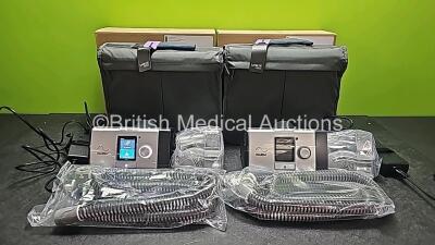 2 x ResMed Lumis 150 VPAP ST Units (Both Power Up) with 2 x Power Supplies, 2 x ResMed ClimateLineAir Oxy Tubes and 2 x ResMed Humidifier Chambers in Carry Bags *Like New in Box* *SN 22201151582 / 22201151585*