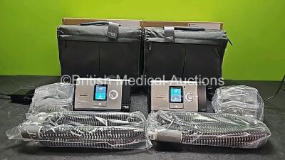 2 x ResMed Lumis 150 VPAP ST Units (Both Power Up) with 2 x Power Supplies, 2 x ResMed ClimateLineAir Oxy Tubes and 2 x ResMed Humidifier Chambers in Carry Bags *Like New in Box* *SN 22201151759 / 22201151443*