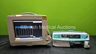 Mixed Lot Including 1 x CareFusion Alaris PK Syringe Pump (Powers Up) and 1 x Philips IntelliVue MP20 Junior (Powers Up and Damaged Case - See Photo) * SN DE 50403978 /