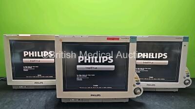 3 x Philips IntelliVue MP70 Patient Monitors (All Power Up, All with Cracks In Casing and 1 x Missing Dial - See Photo) *SN DE52033891 / DE84381776 / DE73164970*