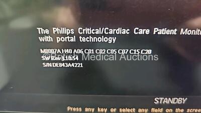 Mixed Lot Including 1 x Hologic Novasure REF RFC2010 RF Controller Model 10 (Powers Up with System Fault) and 1 x Philips IntelliVue MP70 Patient Monitor (Powers Up and Damaged Module Connector - See Photo) *SN 38868K17D0 / DE843A4221* - 6