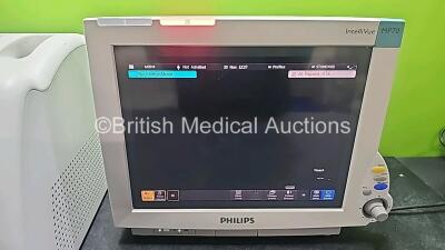 Mixed Lot Including 1 x Hologic Novasure REF RFC2010 RF Controller Model 10 (Powers Up with System Fault) and 1 x Philips IntelliVue MP70 Patient Monitor (Powers Up and Damaged Module Connector - See Photo) *SN 38868K17D0 / DE843A4221* - 7