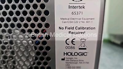 Mixed Lot Including 1 x Hologic Novasure REF RFC2010 RF Controller Model 10 (Powers Up with System Fault) and 1 x Philips IntelliVue MP70 Patient Monitor (Powers Up and Damaged Module Connector - See Photo) *SN 38868K17D0 / DE843A4221* - 11