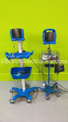 2 x GE Carescape V100 Vital Signs Monitors on Stands with Selection of Leads (Both Power Up - 1 x Damaged BP Hose Port - See Pictures) *S/N SH615442366SA*