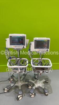 2 x EDAN iM50 Touch Screen Patient Monitors Including ECG, SpO2, NIBP, IBP1, IBP2, T1, T2 and CO2 Module Holder Options *Mfd 2020* with Selection of Cables (Both Power Up - 1 x Stand Missing Wheel) *S/N 360069-M20407100124 / 360069-M20407120044*