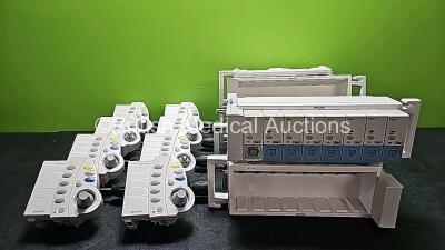 Job Lot Including 8 x Philips M8026-60002 Remote Keypads (2 x Missing Dials), 14 x Philips M8048A Module Racks (6 x in Photo - 14 x in Total) and 8 x IntelliVue SpO2 Modules (1 x Missing Case - See Photo) *Cage*