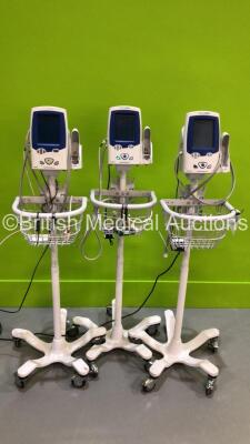 3 x Welch Allyn SPOT Vital Signs LXi Monitors on Stands (1 x Powers Up)