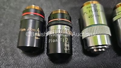 Nikon OPTIPHOT Benchtop Microscope with 2 x CFW 10x Eyepieces, 1 x CF Photo 5x Eyepiece, 1 x Lietz Wetzlar *160/0.17 NPL Fluotar 40/0.70 Optic, 1 x Nikon Plan Apo 20 0.65 160/0.17 Optic, 1 x Nikon Plan Apo 10 0.4 160/0.17 Optic, 1 x Nikon Plan Apo 4 0.16 - 5