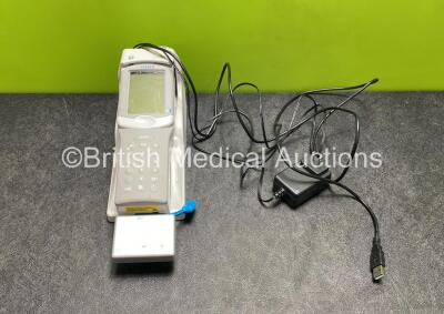 Abbott i-STAT 1 Portable Clinical Analyzer Handheld Blood Analyzer (Powers Up with Scratched Screen, Requires Update - See Photos) with 1 x i-STAT Electronic Simulator, 1 x i-STAT 1 Docking Station and Power Supply (Foreign Plug)