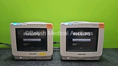 2 x Philips IntelliVue MP5 Touchscreen Patient Monitors Including ECG, SpO2 and NBP Options (All Power Up, Both Missing Batteries and Both Damaged Cases - See Photos)