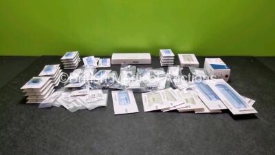 Job Lot of Various DePuy Synthes Surgical Instruments Including, Screws, Clamps, Mandible Plates, Adaption Plates and Combination Clamp