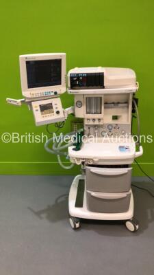 Datex-Ohmeda Aespire Anaesthesia Machine with Datex-Ohmeda 7900 Ventilator Software Version 1.4 (Some Screen Distortion - See Photo) Datex-Ohmeda S/5 Monitor, Datex-Ohmeda M-CAi0V Gas Module with Spirometry, Datex-Ohmeda M-NESTPR Module, Bellows and Hoses