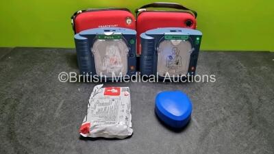 2 x Philips Heartstart HS1 Defibrillators (Both Power Up) In Carry Case with 2 x Ref M5070A Batteries *Install Before - 2023*