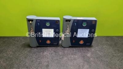 2 x Philips FR2+ Defibrillator (Both Power Up, 1 x with Not Ready For Use Message)