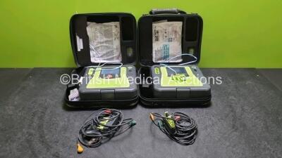 2 x Zoll AED PRO Defibrillators (Both Power Up) In Carry Case with 2 x 3 Lead ECG Leads, 2 x Batteries and 3 x In Date Electrode Packs