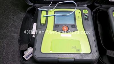 2 x Zoll AED PRO Defibrillators (Both Power Up) In Carry Case with 2 x 3 Lead ECG Leads, 2 x Batteries and 3 x In Date Electrode Packs - 2