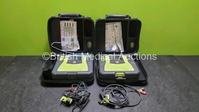 2 x Zoll AED PRO Defibrillators (Both Power Up) In Carry Case with 2 x 3 Lead ECG Leads, 2 x Batteries and 1 x In Date Electrode Pack