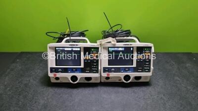 2 x Physio Control Medtronic Lifepak 20e Defibrillators / Monitors *Mfd - 2015* (Both Power Up, Both Missing Doors) Including Pacer, ECG and Printer Options with 2 x Paddle Leads and 2 x 3 Lead ECG Leads *SN 44186033 / 43291388*