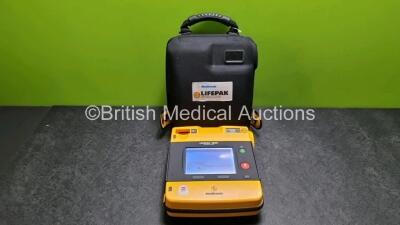 Medtronic Lifepak 1000 Defibrillator (Powers Up) In Case *SN 35274105*