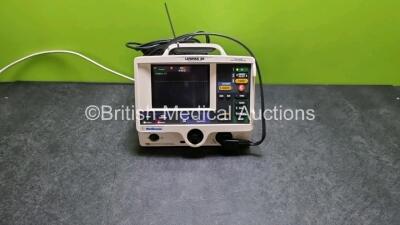 Physio Control Medtronic Lifepak 20 Defibrillator / Monitor (Powers Up, Missing Door) Including Pacer, ECG and Printer Options with 3 Lead ECG Lead and Padde Lead *SN 325707596*