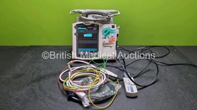 Philips Heartstart MRx Defibrillator (Powers Up) Including Pacer ,ECG, C02, SpO2 NIBP and Printer Options with External Paddle Dock with External Hard Paddles, 1 x Paddle Lead, 1 x 3 Lead ECG Lead, 1 x Philips M3725A Test Load, 1 x Philips M3538A Battery 