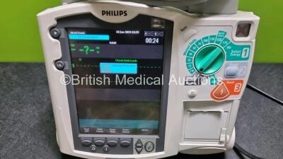 Philips Heartstart MRx Defibrillator (Powers Up) Including Pacer ,ECG, C02, SpO2 NIBP and Printer Options with External Paddle Dock with External Hard Paddles, 1 x Paddle Lead, 1 x 3 Lead ECG Lead, 1 x Philips M3725A Test Load, 1 x Philips M3538A Battery - 2