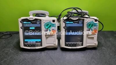 2 x Philips Heartstart MRx Defibrillators (Both Power Up) Including Pacer and ECG Options with 2 x Paddle Lead *SN US00203801 / US00207676*